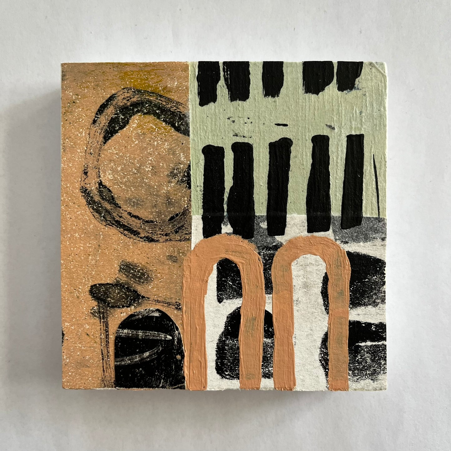 Collage on wood block C11