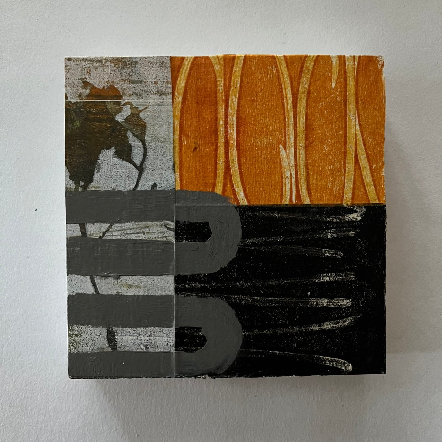 Collage on wood block C16