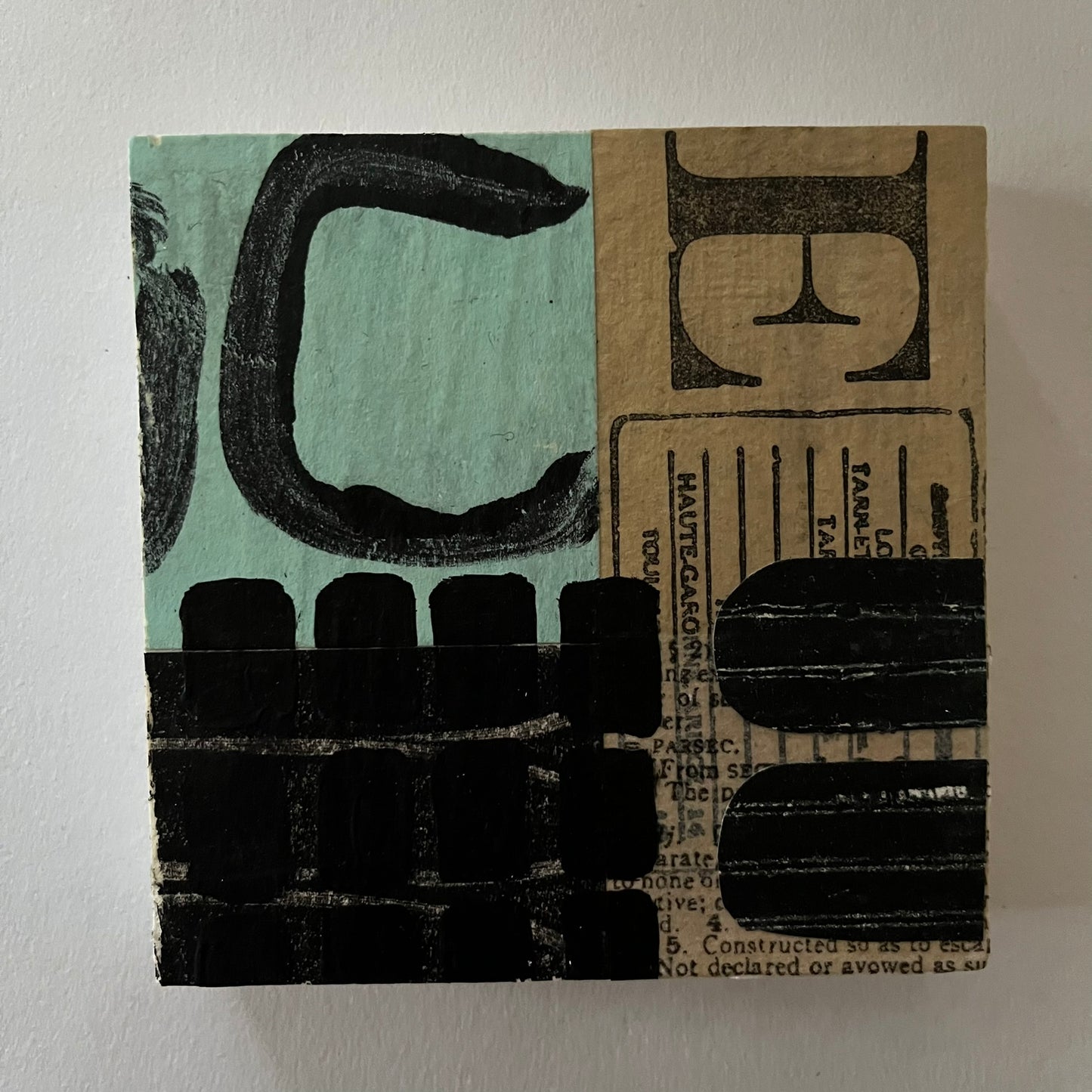 Collage on wood block C20